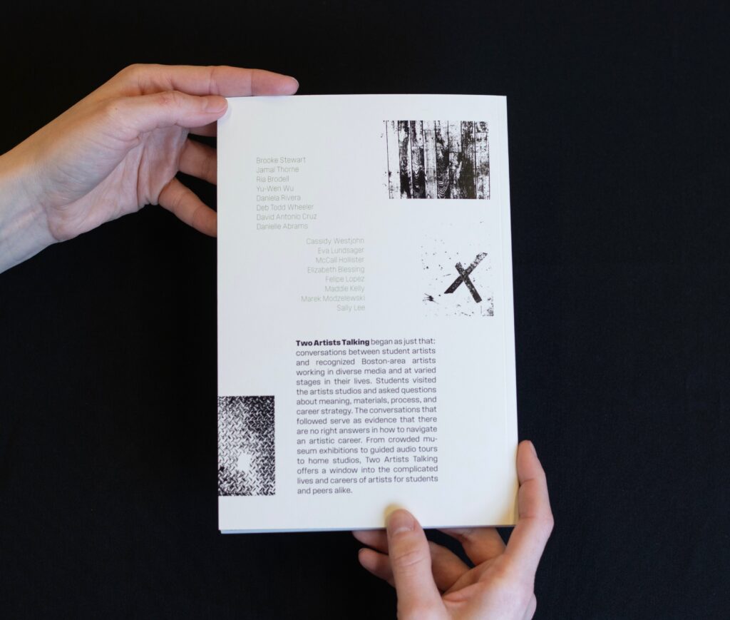 A book held by two hands