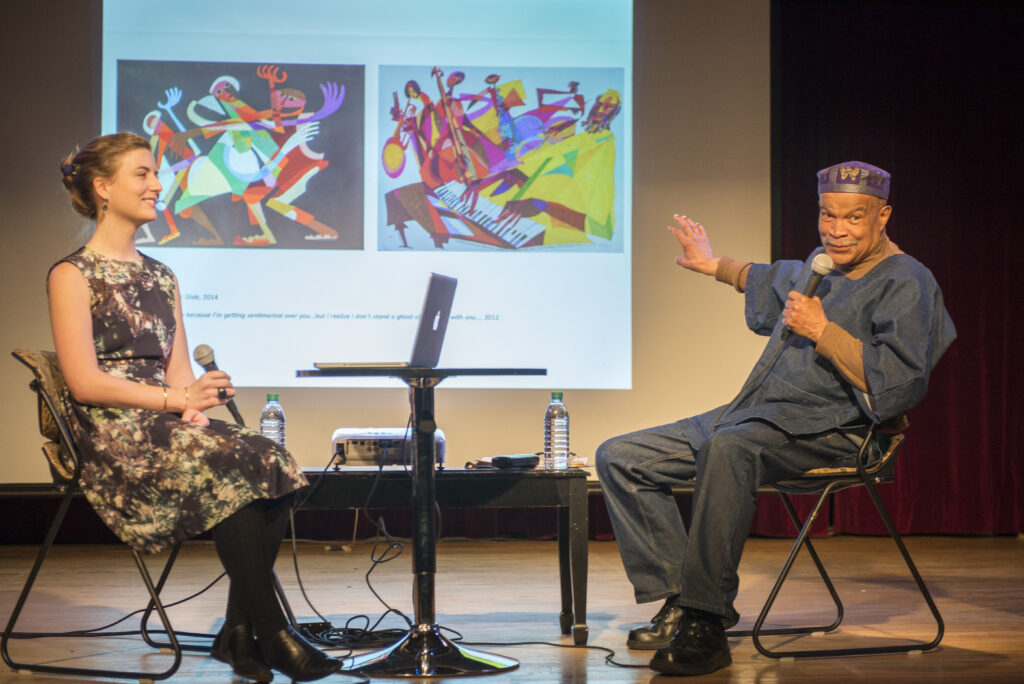 Two people on a stage