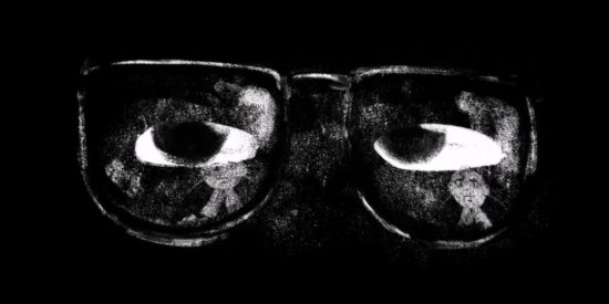 A black and white cartoon of a large pair of glasses with eyes