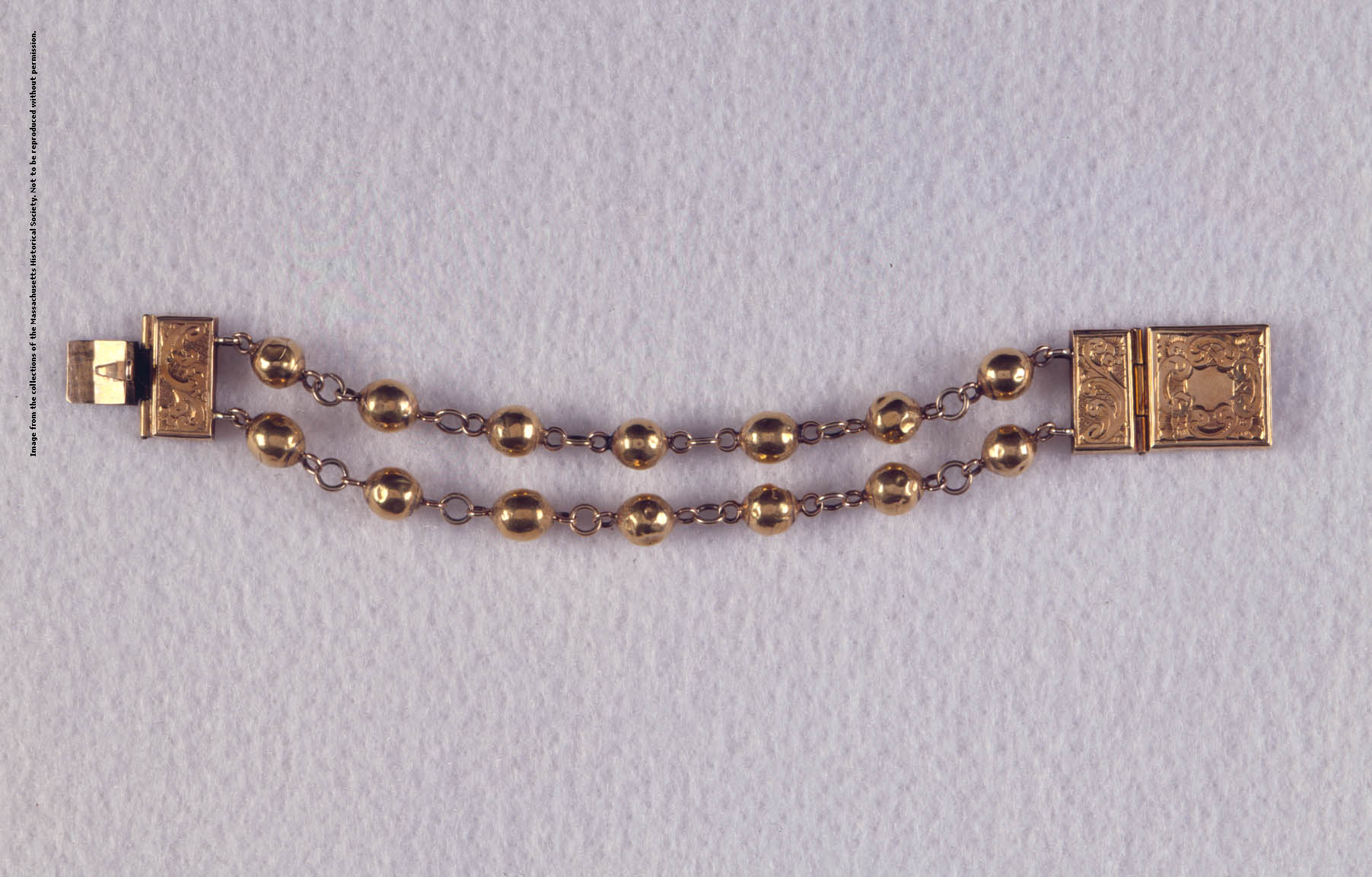 Photo of a bracelet made of gold beads