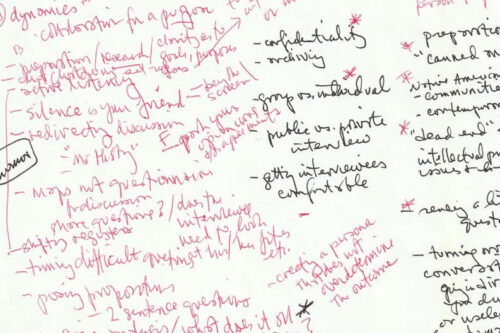 Handwritten notes on white paper